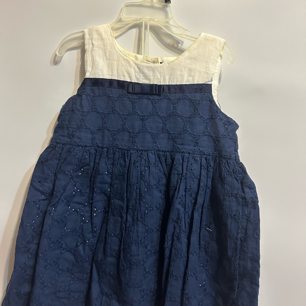 Navy blue and white dress has been wore no time